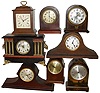 Clocks- 13 (Thirteen) American 8 days, time and strike, wood case mantel clocks, 20th century