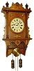 Waterbury Clock Co., Waterbury, Conn., "Study" variant wall clock, 8 days, time and strike, weight driven movement in an oak case with painted metal dial, c1910