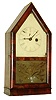 Forestville Hardware Clock Co., Forestville (Bristol), Conn., miniature steeple or "Sharp Gothic" mantel clock, 30 hours, time only, spring driven movement in a mahogany veneered case with frosted glass and painted metal dial, c1853