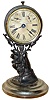 Ansonia Clock Co., New York, N.Y., novelty calendar mantel clock, 30 hours, time and calendar, spring driven movement in an Art Noveau style case depicting lady's hand grasping mirror on nickel plated brass base, papered dial, c1885