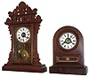 Clocks- 2 (Two):  Jerome & Co. Round Top shelf clock with a 30 hours, time/strike/alarm movement, c1865. The second is an E. N. Welch, Forestville, Conn.walnut kitchen mantel clock (unidentified model) with 8 days, time/strike/alarm movement, c1890.