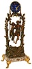 France, swinging clock featuring a patinated spelter sculpture of young couple seated on a swing suspended from two trees with climbing vines, beneath a spherical blue painted clock case with applied Gothic Roman numerals and gilt Louis XV hands and 8 days, time only movement, all mounted to a multicolored marble base on gilt c scroll feet with bud and leaf ornament, with engraved plaque marked "Idylle Printaniere Par Geo Maxime", sculpture also signed "Geo. Maxim" on lower right, c1890