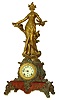Ansonia Clock Co., New York, NY, "Cymric base with statue no 1175", 8 days, time & Strike brass movement figural mantel clock, c1904