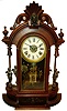 Ansonia Clock Co, Ansonia, Conn., "Triumph" walnut mirror sided mantle clock, c1880, 8 days, time, strike and alarm.