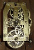British United Clock Co., Birmingham, England, 8 days, paper mache advertising clock for Milkmaid Milk "Now's The Time to Buy It". At first glance this timepiece looks to be a Baird clock, but is English made, c1900.
