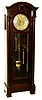 Waltham Clock Co., Waltham, Mass., "No. 983" tall clock, 8 days, time, strike and Westminster chime on 5 tubes, three brass weight driven movement in a mahogany case with full capped columns and silvered brass dial with reticulated brass center, c1920