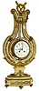 France, lyre clock, white marble case with molded base decorated with gilt trim and foliate ornament, the lyre with acanthus, floral garlands, beaded trim, and a large festoon of fruits and flowers, the top with wreath, torch, and quiver, white enamel Arabic numeral dial with polychrome enamel decoration, gilt Louis XV style hands, gilt bezel with convex glass, and a ring of brilliants surrounding the dial and attached to the pendulum, and oscillating with it, 8 days, time and strike, Pendule a Paris movement, c1900