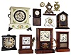 Clocks- 9 (Nine) and Watches in holders- 2 (Two): Optical illusion alarm clock in wood cube case; 30 hours, time only cottage clock; plug-in Spartus electric time only cottage clock; New Haven cottage clock converted to plug-in electric; New Haven 8 days, time and strike, painted wood mantel clock; German 30 hours, time only porcelain novelty clock; Ansonia small time only painted wood pointed top cottage clock with round movement; Tiffany 8 days, travel clock in leather case with Waltham 7 jewel movement; two cast metal watch holders with Swiss pocket watches