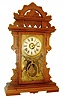 E. N. Welch Mfg. Co., "Donita", 8 days, time, strike and alarm walnut mantel clock, c1892