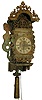 Frisian stoelklok, polychrome painted shelf with mermaids, lead ornaments with gilding and silver foil, and coated with tinted wash, Roman numeral painted dial with landscape scene, cast hands, brass four pillar time and strike, movement with alarm, 19th century