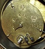French swing clock, "GLT, Paris" 8 days, movement c1890, later bronzed figural base of white metal.