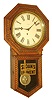 E. Ingraham Co., Bristol, Conn., "Hartford" advertising wall clock, 8 days, time only, spring driven movement in a pressed oak case with papered metal dial and advertising "SLOAN'S LINIMENT" on lower glass, c1910
