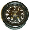 Seth Thomas Clock Co., Thomaston, Conn., ship's bell wall clock made for U.S. Maritime Commission, 5" dial, 8 days, time and ship's bell strike, spring driven movement in a cast iron case with phenolic bezel, c1940