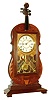 Reproduction Seth Thomas Violin mantel clock, 8 days, time and strike, spring driven Seth Thomas period lyre movement in a violin form walnut case with painted metal dial and musical themed silk screened glass, dated 1965