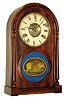N.L. Brewster, Bristol, Conn., tin plate mantel clock, 8 days, time and strike, spring driven, tin plate movement with J. Ives Patent rolling pinion and rolling escapement in a mahogany veneer case with turned columns, painted metal dial reverse painted tablet, c1862