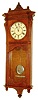 Seth Thomas Clock Co., Thomaston, Conn. "Marcy" wall clock, 8 days, time and 1/4 hour strike on two cup bells and hour strike on cathedral gong, spring driven movement in an oak case with painted metal dial, c1890