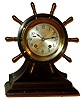 Chelsea Clock Co., Boston, for Negus, New York, 4" dial "Yacht Wheel" 8 days, ship's bells bronze, brass and mahogany hinged bezel mantel clock, #605437, c1957