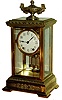 Seth Thomas Clock Co., Thomaston, Conn., "Empire No.18 with Urn" 8 days, time and strike, brass and glass crystal regulator mantel clock, c1909