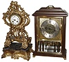 Clocks- 2 (Two) 8 days, mantel clocks: French cast metal time and strike, on padded carved gilt wood base, c1850; Ansonia "Gold Medallion" modern wood and beveled glass bracket clock with German chiming movement, c1980
