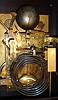 German, oak cased bracket or table clock, 3-fusee, 8-bell, by Winterhalder & Hoffmeier. Chiming the quarters on choice of gongs (Westminster) or bells (Whittington), and with a rectangular dial with gilt cherub spandrels and subsidiary dials for time regulation and choice of tune, c1890