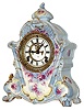 Ansonia Clock Co., New York, N.Y., "No. 502" Royal Bonn porcelain clock, 8 days, time and strike, spring driven movement with open escapement in a blue and white multicolor floral case, two part enamel dial, c1910