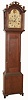 Samuel Abbott, Dover, N.H., tall clock, 8 days, time and strike, weight driven movement in a walnut (?) case with fretted hood, reeded full columns flanking dial, and trunk with reeded corner columns surmounted by brass capitals resting on ogee bracket feet. The painted iron dial is decorated with patriotic shields, c1812