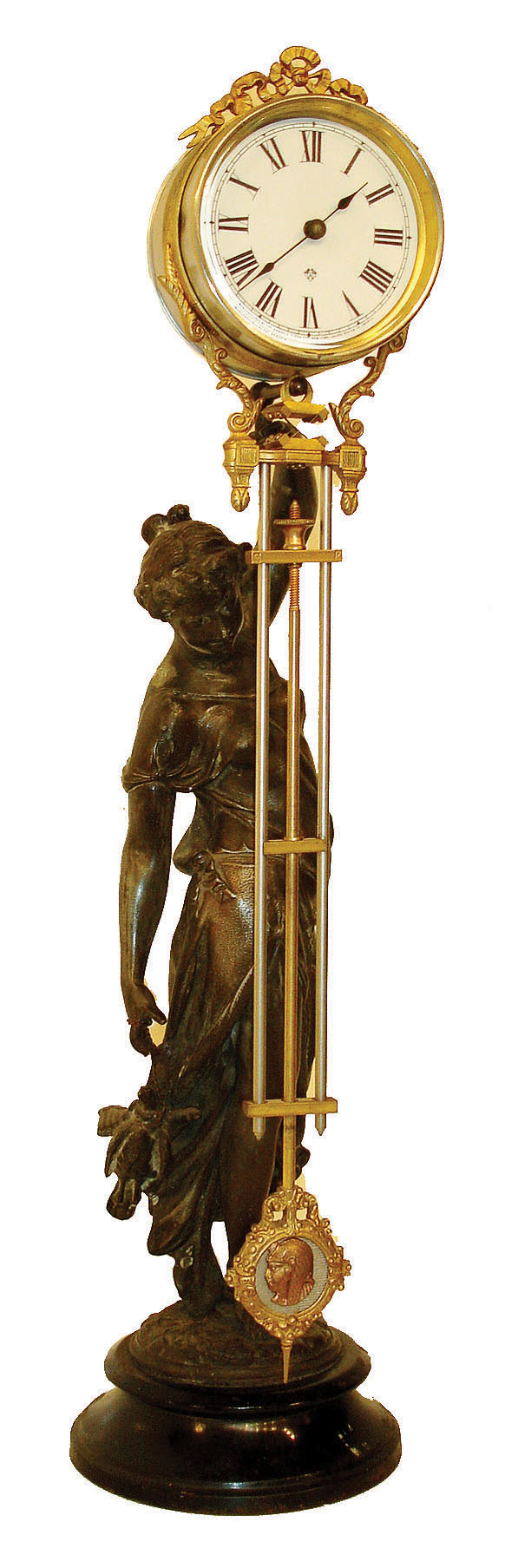 Ansonia Clock Co., New York, "Huntress" canister swinger, patinated spelter female figure holding the clock aloft in her left hand, mounted to a japanned iron base, c1880. The clock and pendulum assembly a late 20th century reproduction, containing an 8 day time only, rear wind movement, Roman numeral paper dial and blued steel hands — Antique Clocks Price Guide