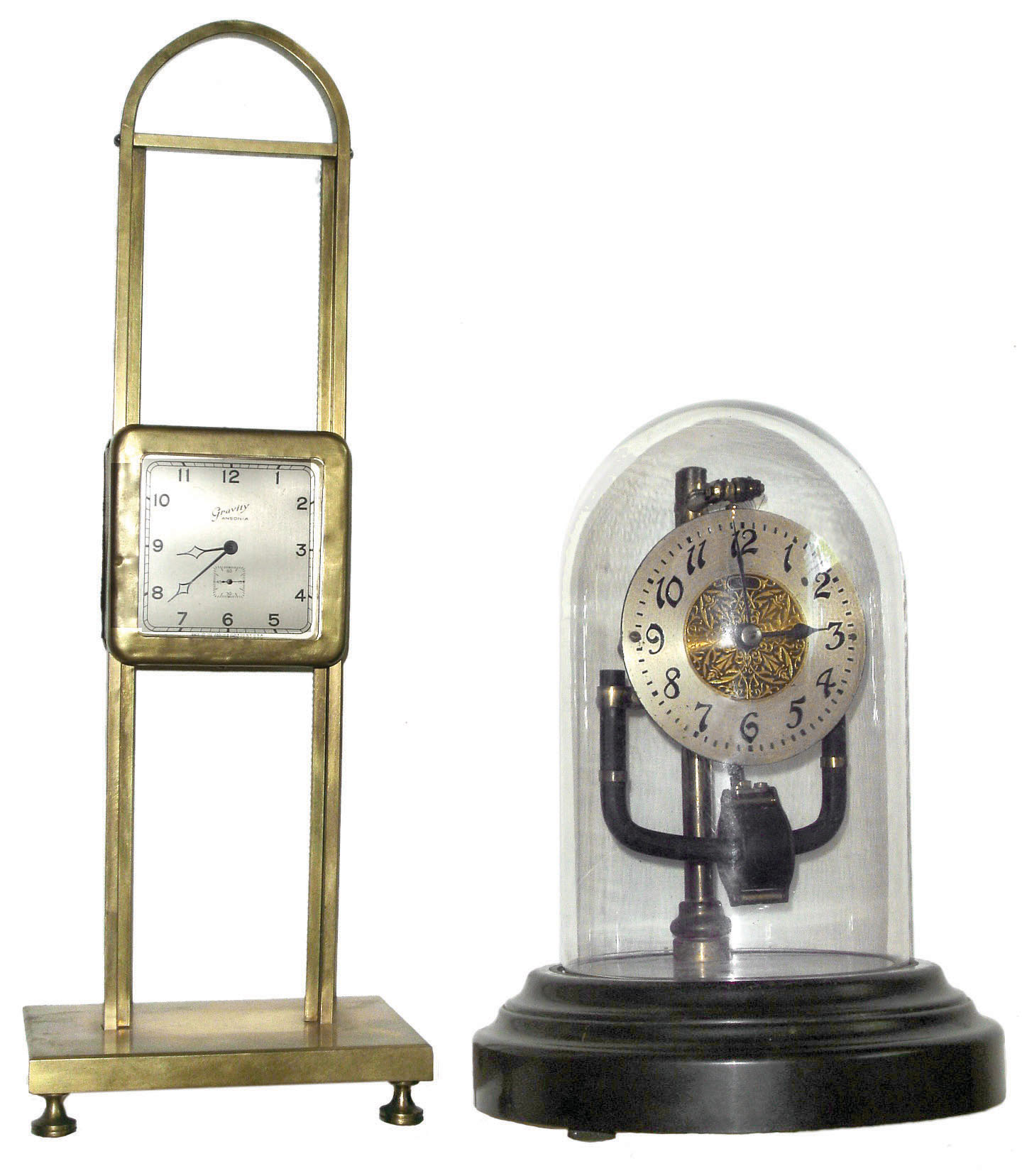Clocks- 2 (Two): Bulle, French made electromechanial; Ansonia "Gravity" with later brass stand; both early 20th century — Antique Clocks Price Guide