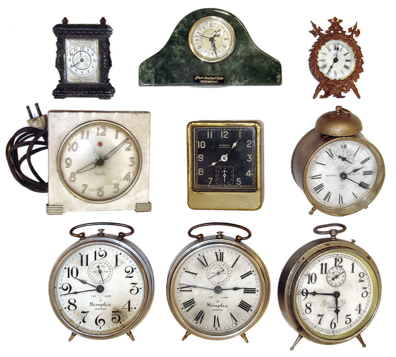 Clocks- 9 (Nine) alarm &amp; novelty clocks: quartz in "New Zealand Trade Greenstone"; two Ansonia "Simplex" alarms; cast metal disk timepiece; Ansonia armorial novelty timepiece; "National Call" alarm; Westclox plug-in electric alarm; Ansonia "Square Pirate" alarm; Ansonia round alarm; early 20th century. — Antique Clocks Price Guide