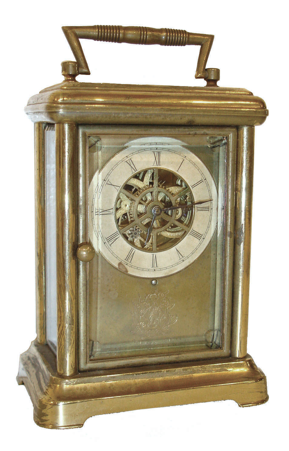 Waterbury Clock Co., Waterbury, Conn.. 8 day time only, carriage clock, employing a skeletonized six spoke long wind movement with the addition of a large barrel to increase duration, lacquered polished brass case, Roman numeral paper dial, dial mask with Waterbury logo and Pat. May 21, 1878, c1880 — Antique Clocks Price Guide