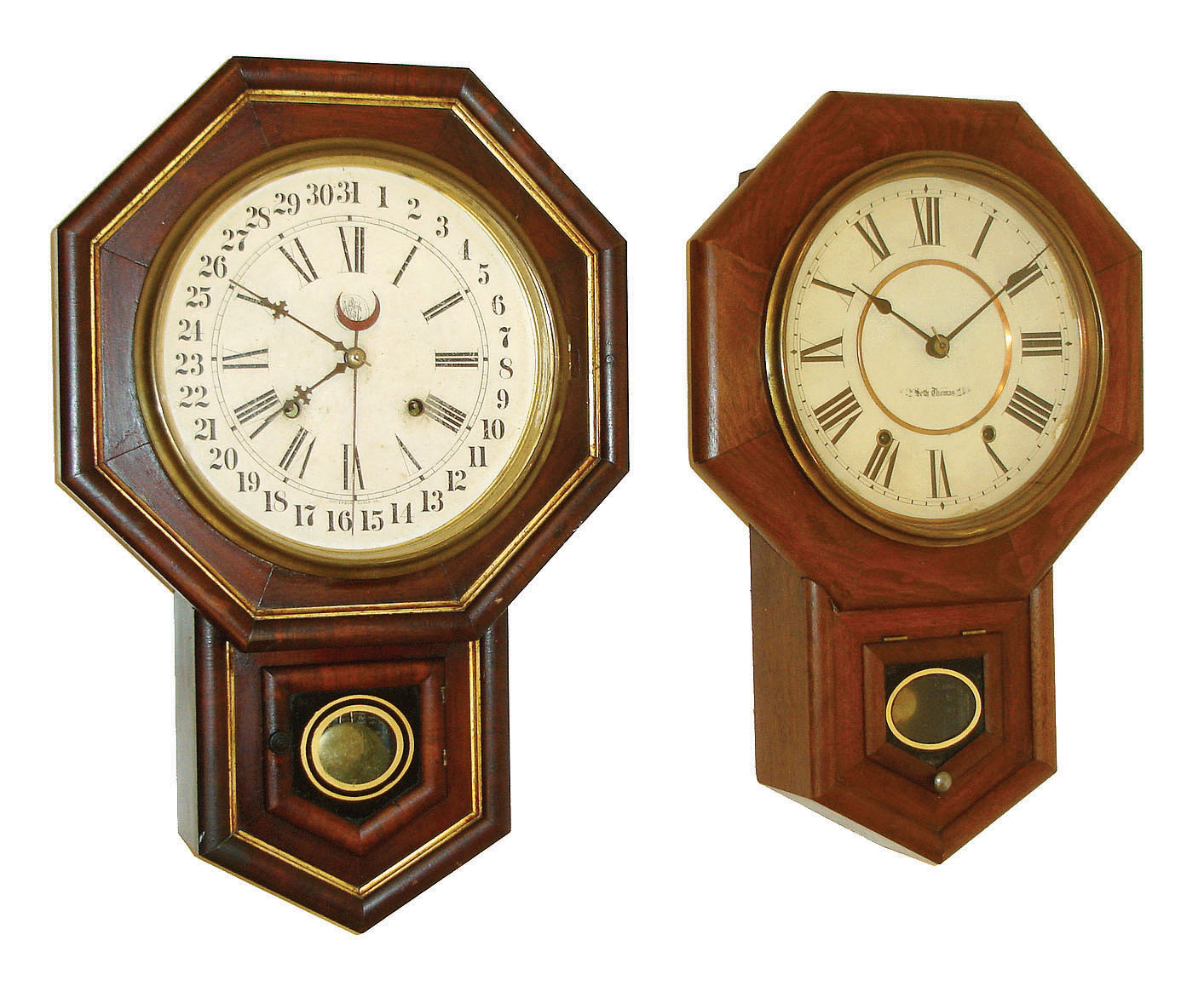 Clocks- 2 (Two) Connecticut wall: (1) Seth Thomas Clock Co., Thomaston, "10 Inch Drop Octagon" 8 days, time and strike,,; c1900. (2) Waterbury Clock Co., Waterbury, "10 Inch Drop Octagon" 8 day time, strike &amp; calendar clock, c1900. — Antique Clocks Price Guide