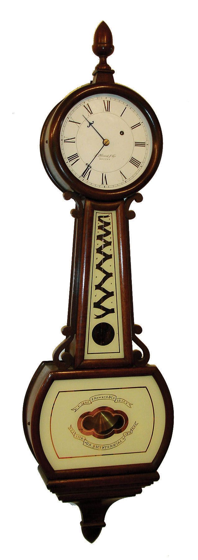E. Howard &amp; Co., Boston, Mass., "Bicentennial Banjo", wall clock, 8 days, time only, weight driven movement in a mahogany case with reverse painted throat and lower tablets with 13 colonies motif and painted metal dial, serial #109, dated 1977 — Antique Clocks Price Guide