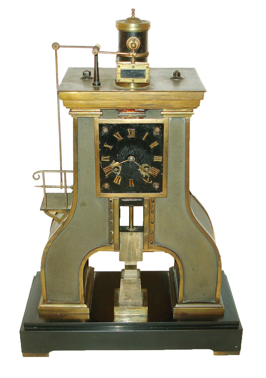 Guilmet, France, industrial series "Steam Hammer", polished and patinated bronze case on a black slate base with polished feet, the hammer forming part of the complex compound pendulum, rising and falling, appearing to strike the anvil as the clock runs, 8 days, time and strike, pendule a Paris movement signed Japy Freres with Guilmets modifications, and also with Guilmet's mark on the back plate, c1880 — Antique Clocks Price Guide