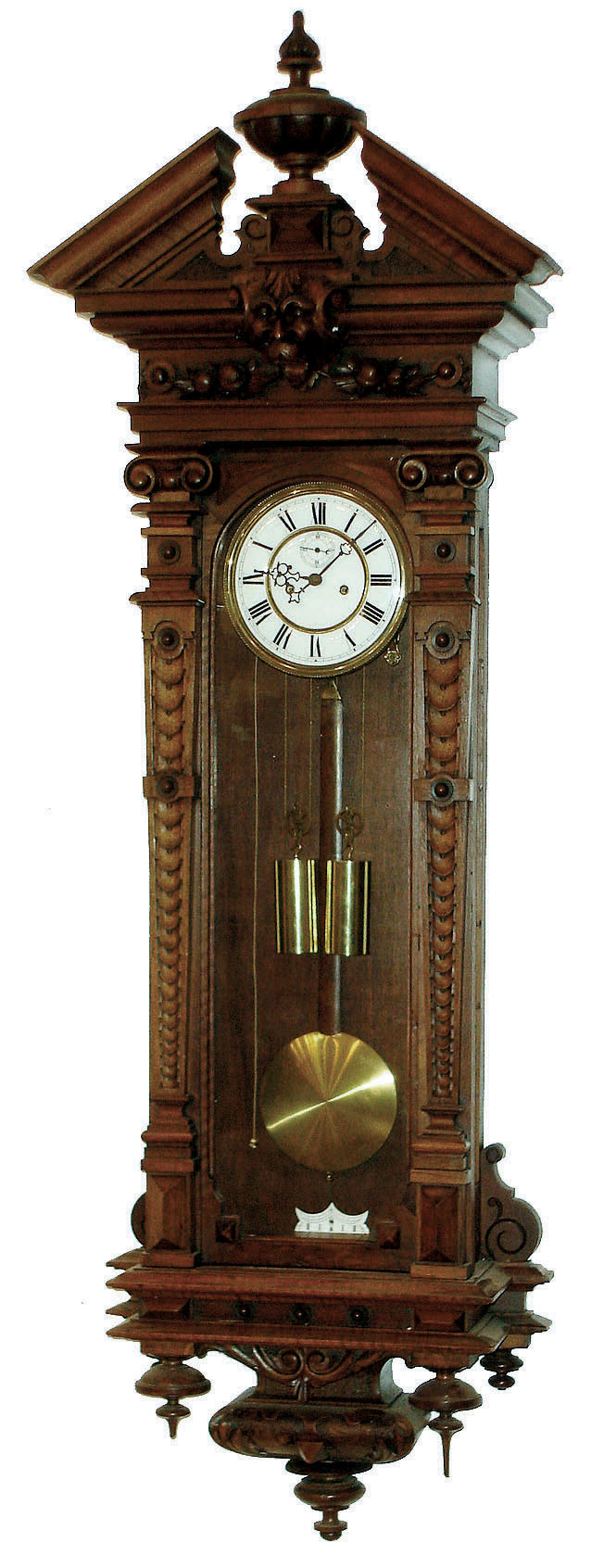 Vienna Regulator wall clock, attributed to Christian Schlenker, Schwennigen, Germany, 8 days, time and strike, two brass weight driven movement in a carved walnut case with two part white enamel dial with subsidiary seconds, c1870 — Antique Clocks Price Guide
