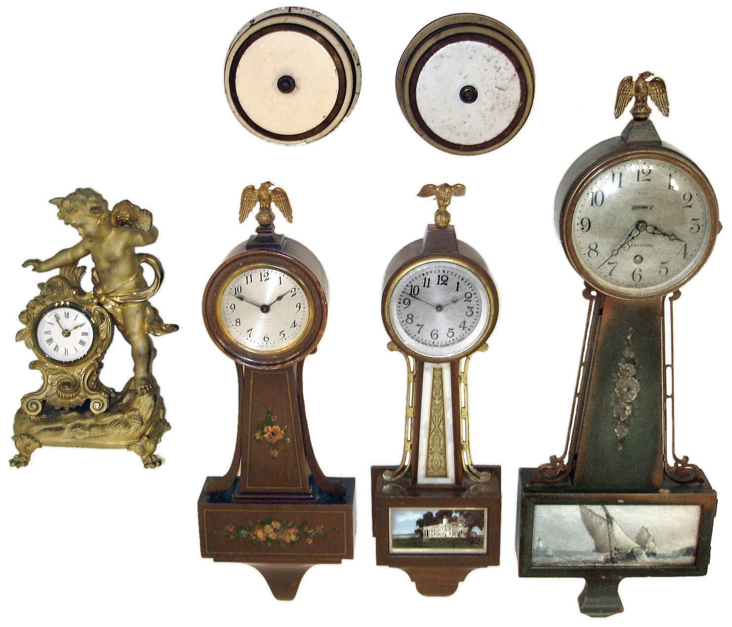 Clocks- 6 (Six) small banjo and novelty: Sessions "Wellfleet" painted 8 day banjo timepiece; Seth Thomas 8 day 4-jewel "Danvers" banjo; New Haven miniature 8 day banjo; two Lux tape measure 30 hour novelties; cast gilt metal figural novelty with newer German 30 hour insert; 20th century — Antique Clocks Price Guide