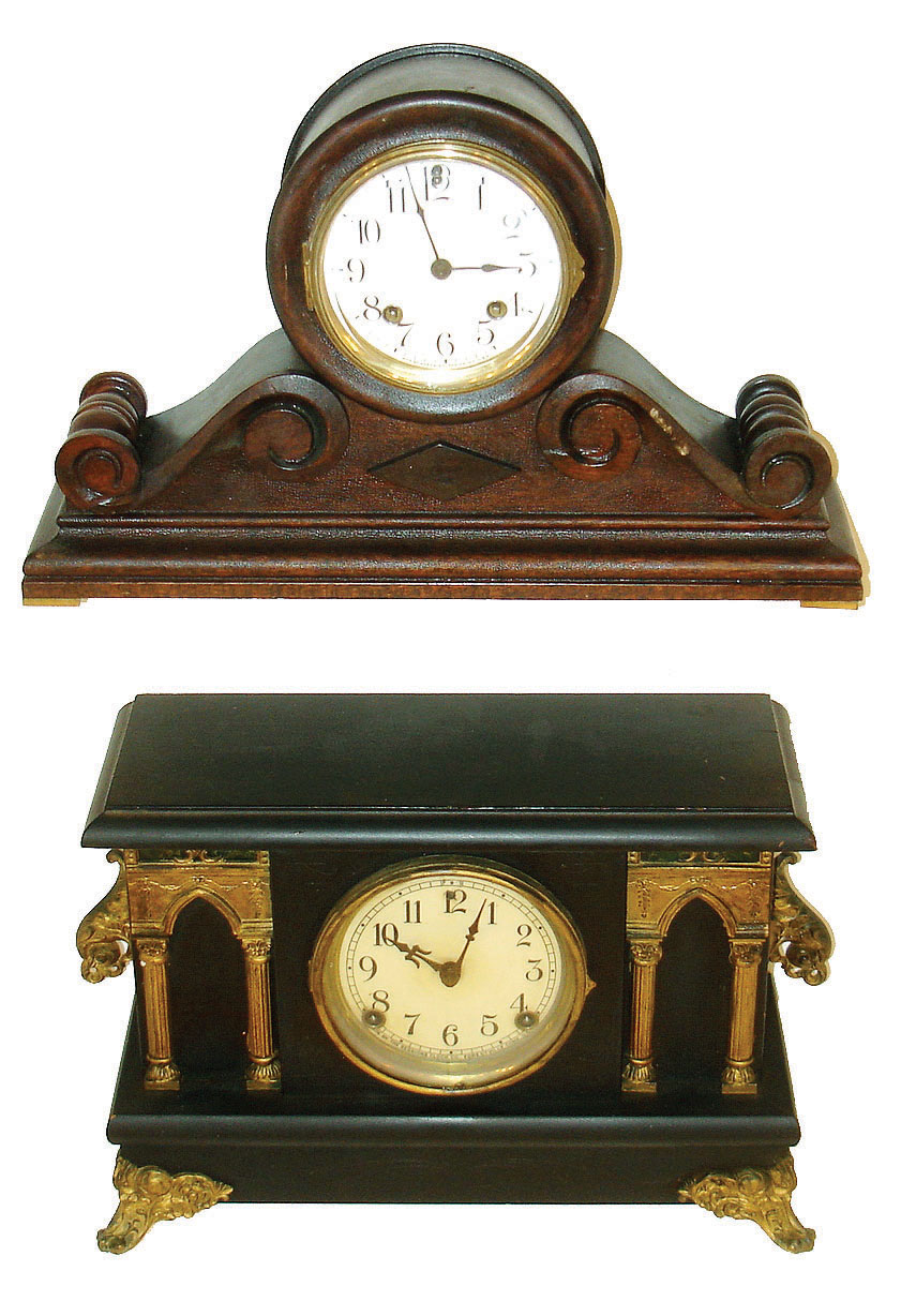 Clocks- 2 (Two): (1) Sessions Clock Co., Forestville, Conn., "Cambria", 8 days, time &amp;strike black mantel clock, c1921. (2) Ansonia Clock Co., New York, "Cabinet No. 31" 8 days, time and strike, tambour mantel clock, c1914. — Antique Clocks Price Guide
