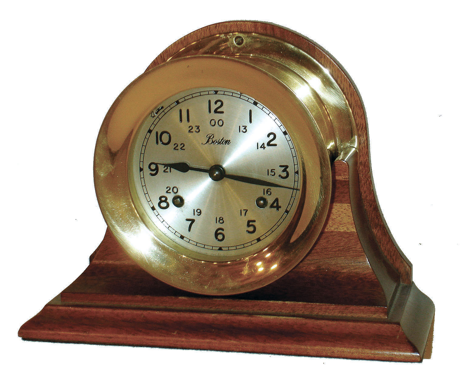 Boston, by Chelsea, brass 8 day time &amp; ship's bell strike marine clock, with screw bezel on mahogany cradle, German 132-071 movement dated 1978, — Antique Clocks Price Guide