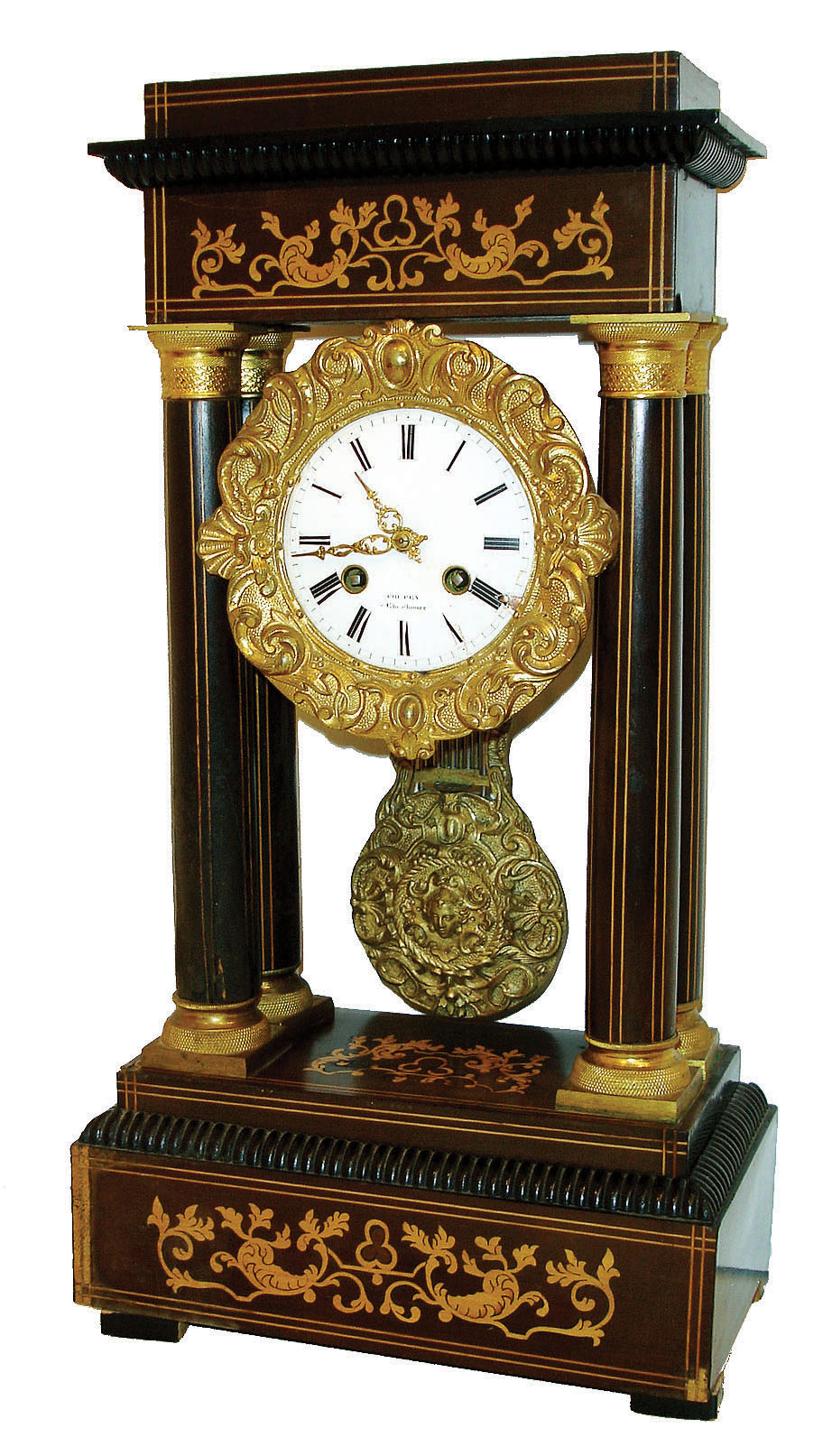 Coppey, Cherbourg, France, 8 days, time and strike, portico clock with pendule a Paris movement, gilt gridiron style pendulum with central mask. rosewood case with light wood stringing and marquetry, ebonized moldings and feet, the 4 columns with gilt capitals and bases, gilt bezel in the rococo style, Roman numeral white enamel dial signed "Coppey a Cherbourg", fancy gilt hands, c1860 — Antique Clocks Price Guide