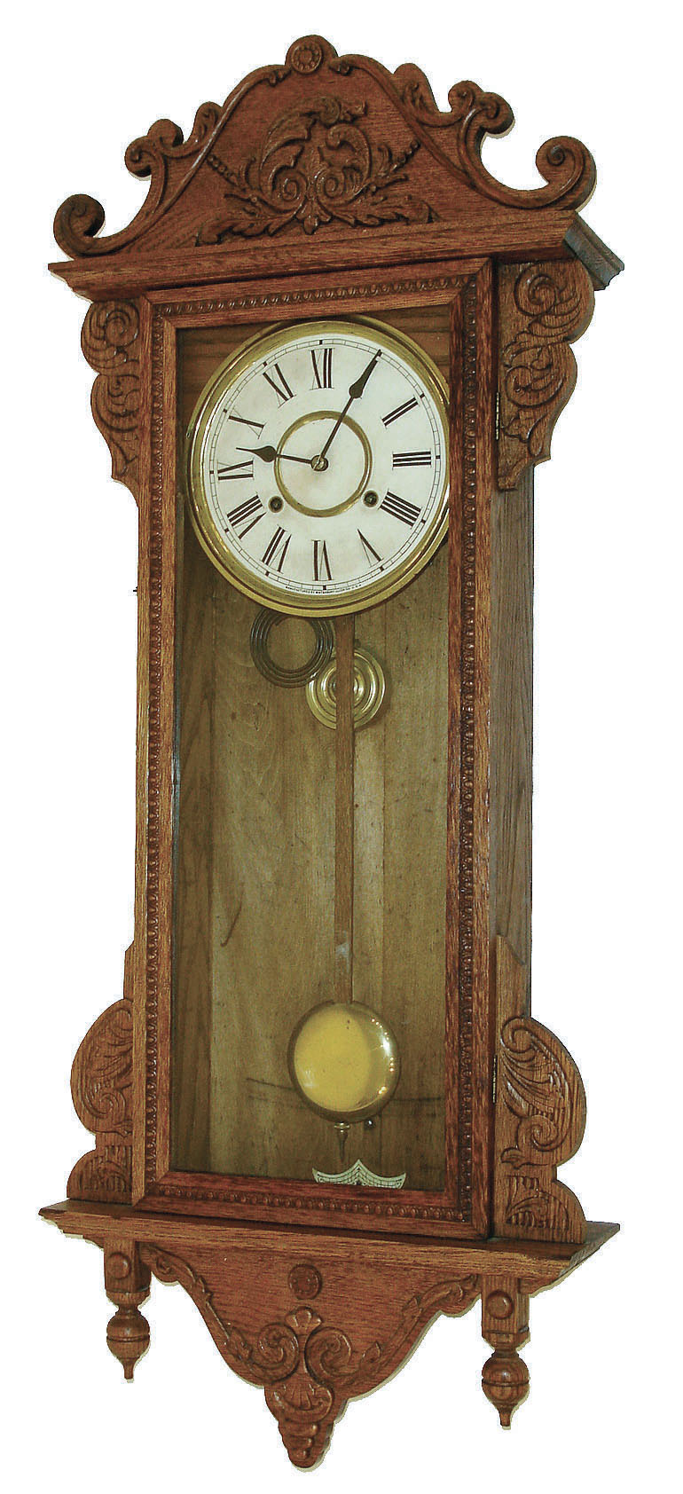 Waterbury Clock Co., Waterbury, Conn.,  "Alton" wall hanging model with 8 days, time and strike, (hour and half hour on cathedral gong) movement in an oak case, c1906. — Antique Clocks Price Guide