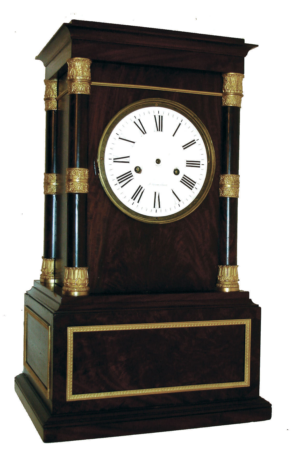 Jean Perrin, Paris, France, 8 days, time and strike, large mahogany table clock in the Directorie style with pendule a Paris movement with silk thread suspension and 5 3/8" diameter plates. Oak case with mahogany veneer case, gilt bronze mounted mahogany columns at the corners supporting a cavetto molded cornice, base with gilt, foliate ornamented trim, Roman numeral white enamel dial signed "Jn. Perrin a Paris", case back with ornate gilt bezel containing a thick beveled glass, c1810 — Antique Clocks Price Guide