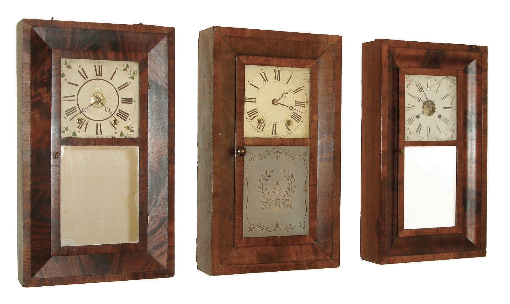 Clocks- 3 (Three) early American 30 hour clocks. (1) Chauncey Jerome, Bristol, CT time and strike, weight driven OG in mahogany veneer case, c1845.  (2) Henry C. Smith, Plymouth, Conn., time and strike, weight driven wood movement OG in mahogany veneered case, c1840. (3) Daniel Pratt, Reading, Mass, time, strike &amp; alarm weight driven wood movement in bevel mahogany veneer case c1840. — Antique Clocks Price Guide