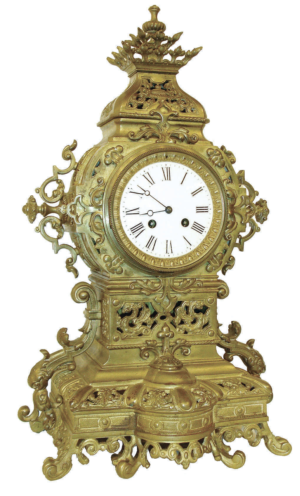 France, gilt brass mantel clock, the architectural cast brass case heavily ornamented with scrolls and acanthus, gadrooning, and much other decoration which defies description, Gothic Roman numeral white enamel dial, blued steel Breguet style hands, 8 days, time and strike, pendule a Paris movement, c1880 — Antique Clocks Price Guide
