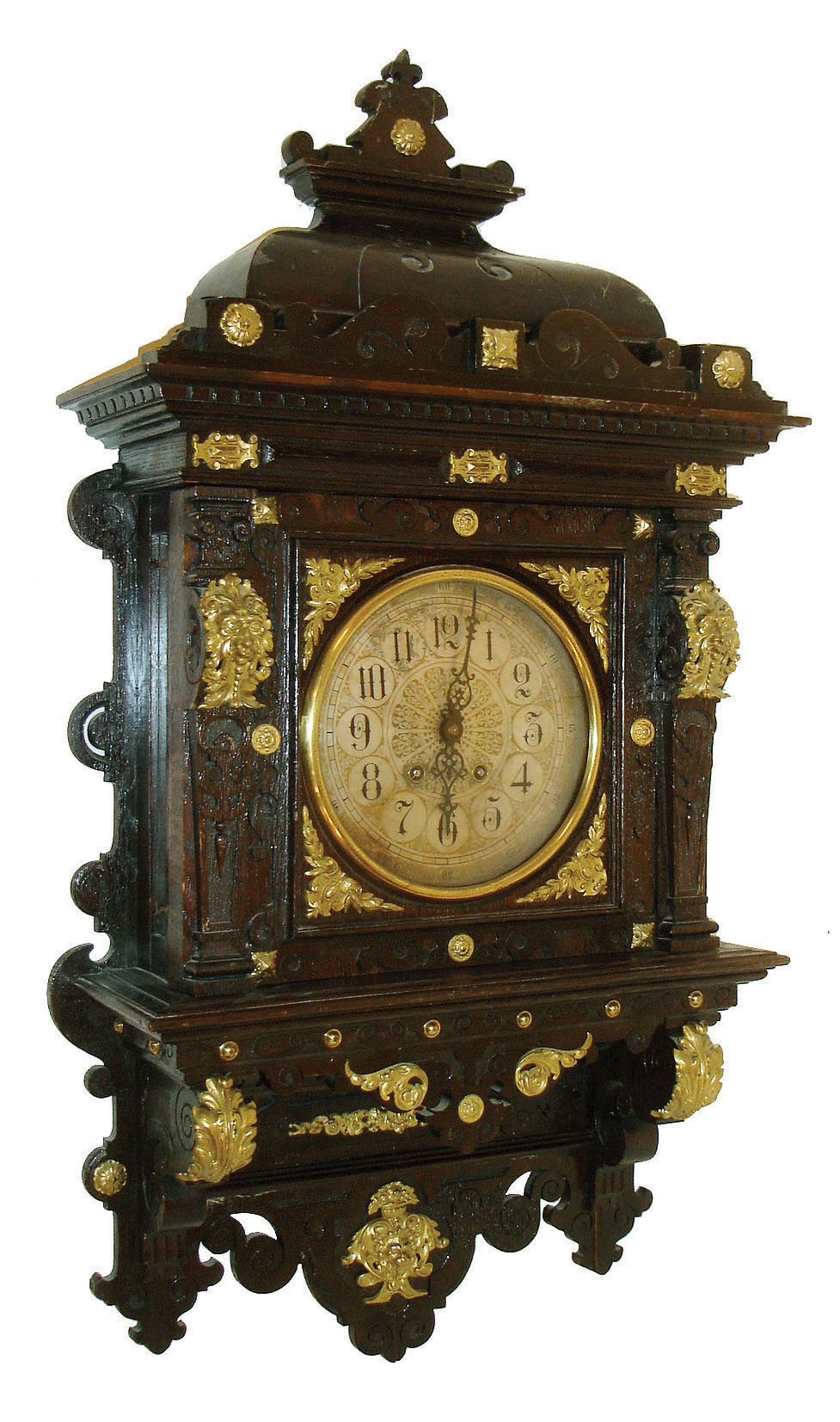 Germany, Remember wall clock, large fumed oak architectural case heavily ornamented with carving and applied cast ornament, also with removable top and crest, Arabic numeral gilt and silvered dial with outer 5 minute markers, pierced steel hands, brass 8 days, time and strike, movement, c1900 — Antique Clocks Price Guide