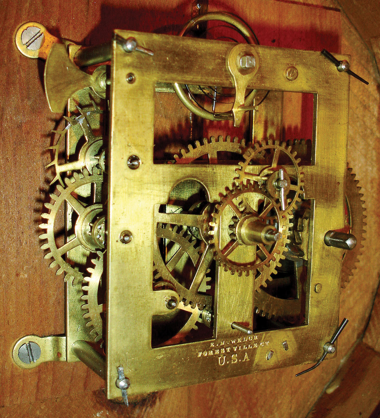 E. N. Welch Mfg. Co., Forestville, Conn., "Round Corner" 30 hours, timepiece in octagonal rosewood veneered case, c1865. — Antique Clocks Price Guide