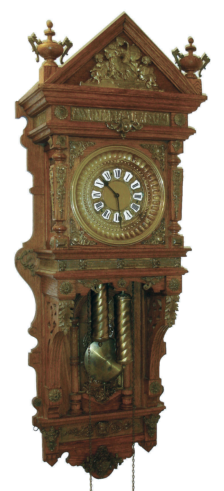 Ansonia Clock Co., New York, "Hanging Antique" time &amp; hour/half hour gong strike weight wall clock in oak case profusely decorated with cast brass trimmings, c1885 — Antique Clocks Price Guide