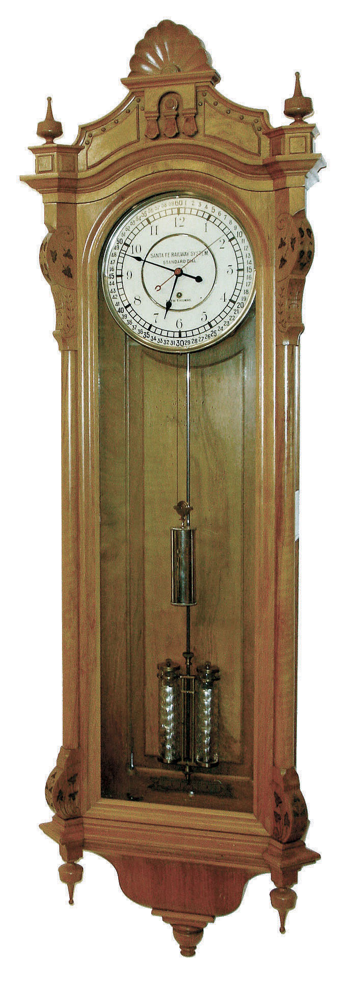 Seth Thomas Clock Co., Thomaston, Conn., "Regulator No. 19", walnut cased wall regulator made for the Santa Fe Railway System (signed on original 12" Montgomery dial), in walnut and walnut veneer case with burled accents, c.1890 — Antique Clocks Price Guide