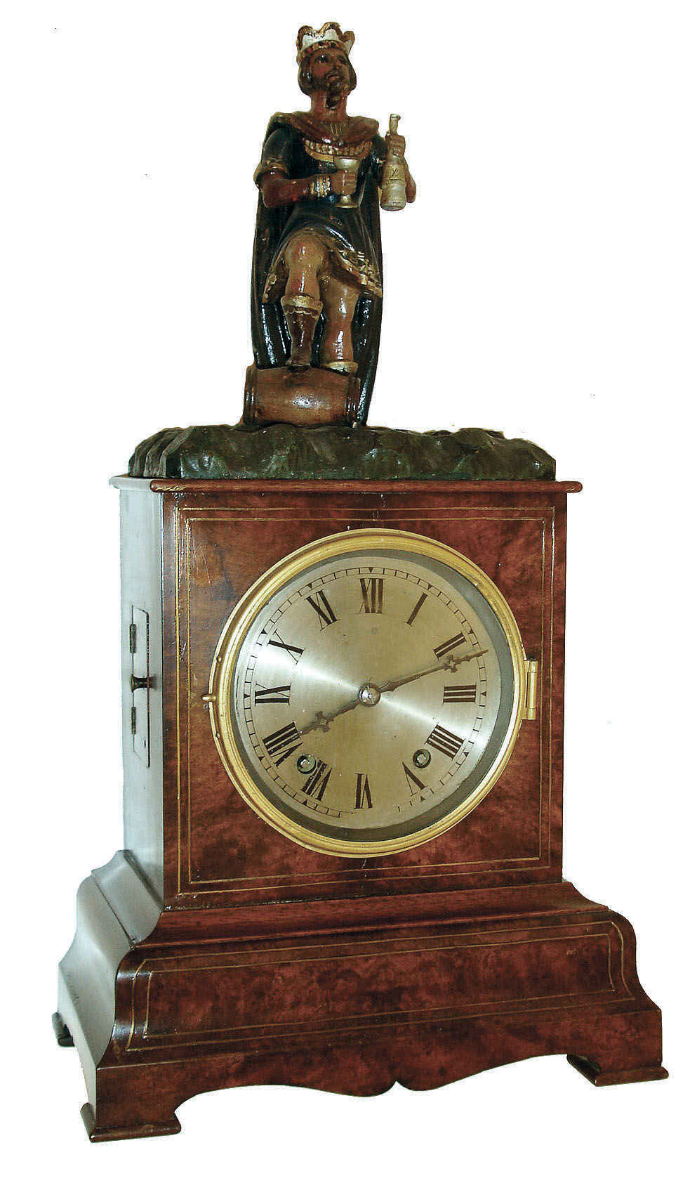 Winterhalder &amp; Hofmeier, Germany, "King Gambrinus" drinker mantel clock, burl walnut case with ogee molded base and brass line inlay, Roman numeral silvered dial, blued steel hands, case top with carved, polychrome painted figure of King Gambrinus, patron saint of beer, the figure with his right foot on a barrel, and when activated, alternately raising a bottle to fill his glass, and then drinking the contents, the action performed twice at each activation, and occurring roughly every 6 minutes, brass 8 day time and swill movement, back of case with small engraved brass plaque marked "H. Rick Clockmaker New York", c1870 — Antique Clocks Price Guide