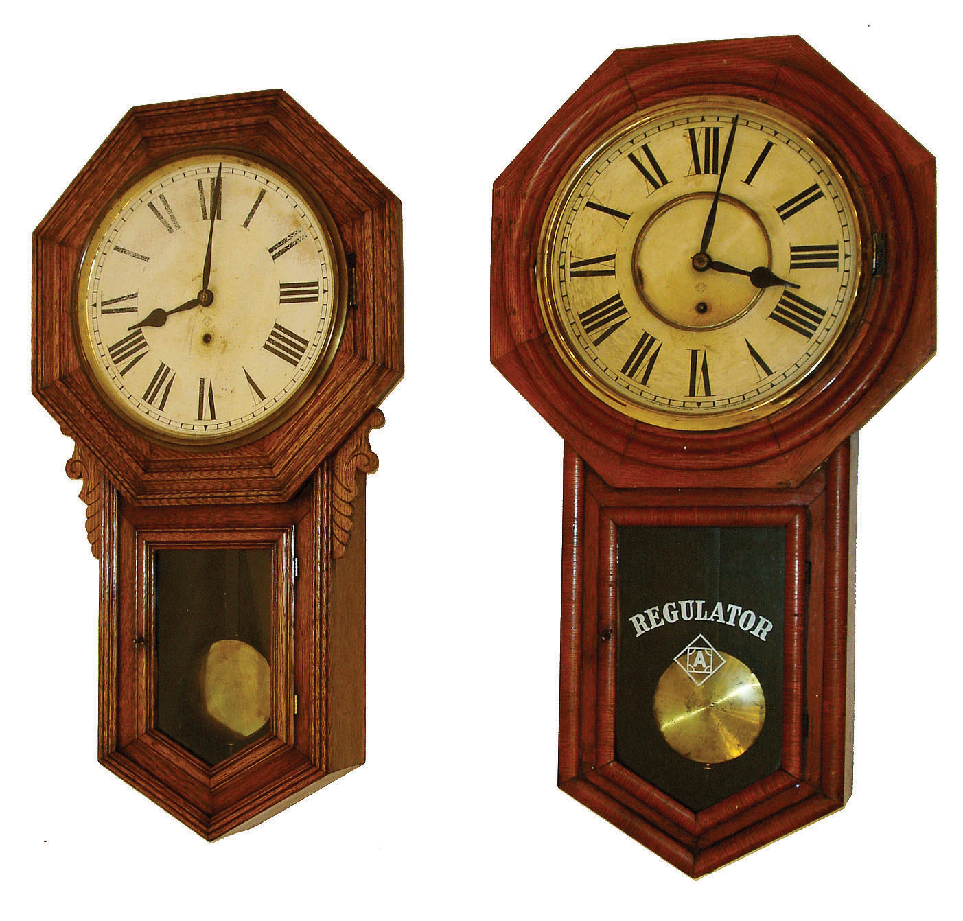 Clocks- 3 (Three): (1) Ansonia Clock Co., New York, "Regulator B", 8 days, wall timepiece, c1900. (2) Ansonia Clock Co., New York, "Regulator A", 8 days, wall timepiece, c1900. (3) New Haven Clock Co., "Regulator Calendar", 8 day wall timepiece, c1900. — Antique Clocks Price Guide