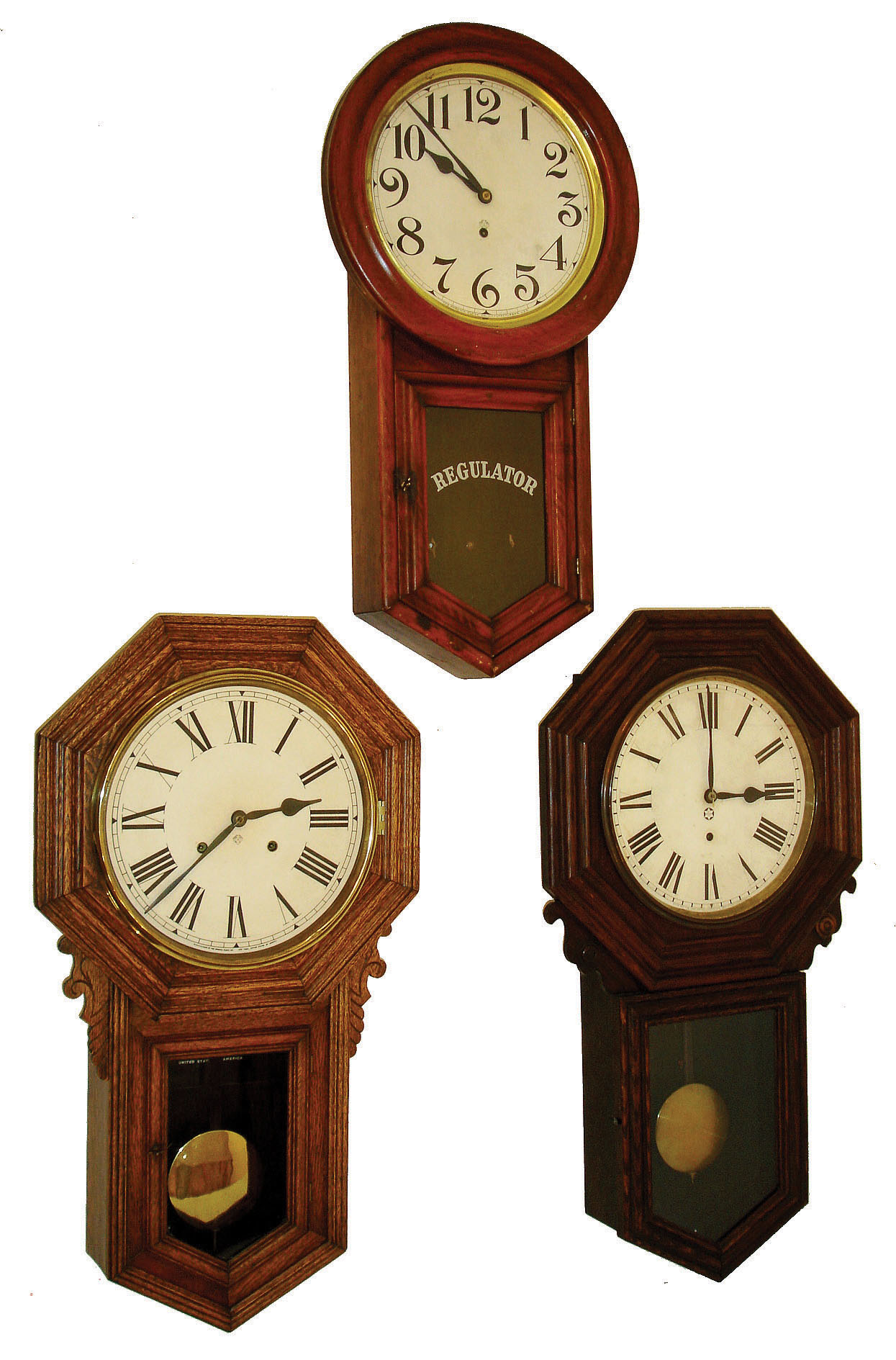 Clocks- 3 (Three) wall: (1) Ansonia Clock Co., New York, "Regulator C", 8 days, wall timepiece, c1900. (2) New Haven Clock Co. "Erie Regulator", 8 days, wall timepiece, c1911. (3) Ansonia Clock Co., New York, "Regulator B", 8 days, time and strike wall clock, c1900. — Antique Clocks Price Guide