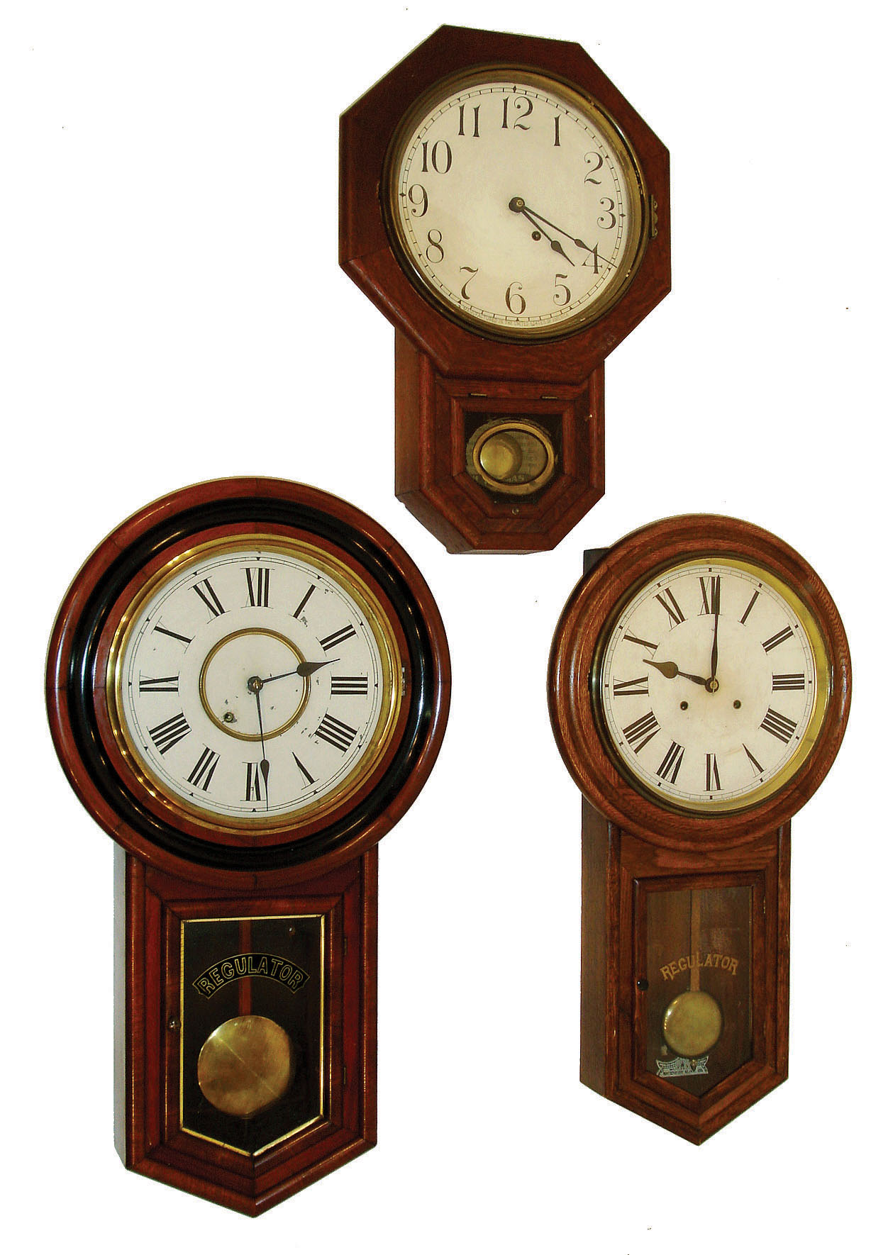 Clocks- 3 (Three) Conn., wall: (1) New Haven Clock Co. "Regulator", 8 days, wall timepiece. (2) Waterbury Clock Co., "Admiral", 8 days, wall timepiece.  (3) Seth Thomas Clock Co., 8 days, schoolhouse wall timepiece, all c. 1900. — Antique Clocks Price Guide